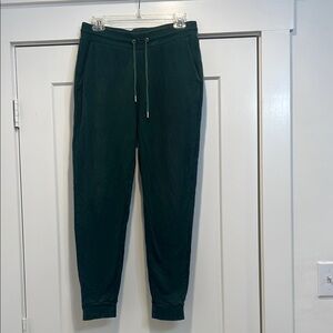 ASOS Green Sweatpants with Elastic Waistband and Tapered Fit size medium.